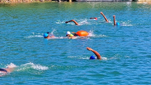 30 Swimmers Complete 13.5km Challenge in Kaptai Lake