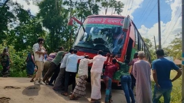BRTC Bus Gets Stuck After Roadside Sinking in Kathalia