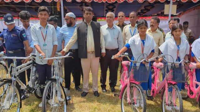 Distributes Educational Supplies, Bicycles to Students in Mongla