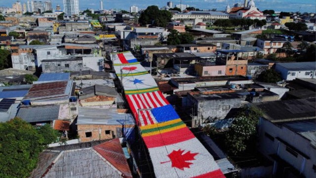 World Cup Fever Sweeps Through Manaus as Residents Transform Street into Football Festival