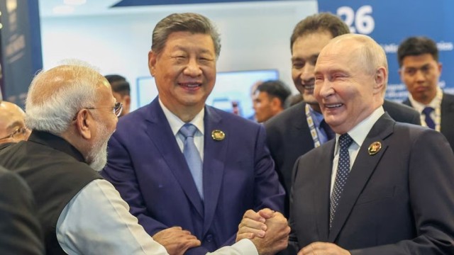 Modi, Putin and Xi Display Warm Ties at BRICS Summit in Delhi