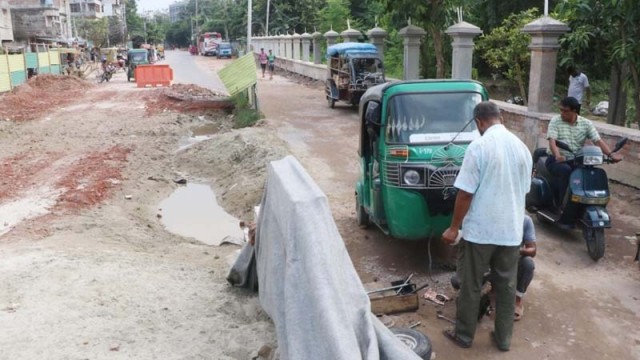 Rajshahi Flyover Projects Miss Deadline, Pothole-Ridden Roads Add to Public Suffering