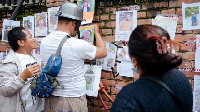 After Nepal floods, families hold symbolic funerals for missing
