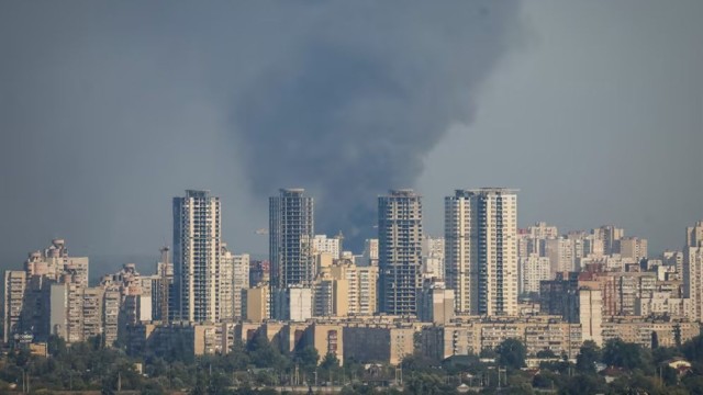 Russian air strikes kill nine in and around Kyiv